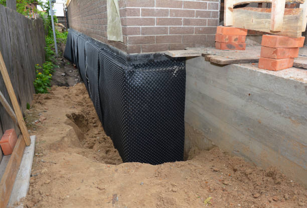 SJ Waterproofing Pros technician performing targeted Sump Pump Installation assessment in Reston, VA